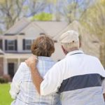 copule looking at continuing-care retirement community at home