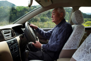 elderly japanese man driving