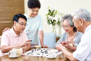 Asian couples playing Go