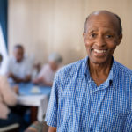 Senior Man in a community room
