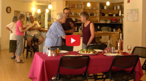 seniors about to have dinner in a cohousing situation