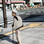 senior woman alone in the streets of Japan
